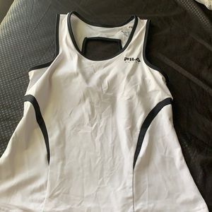 Selling this Filas sports top! Perfect for any outside or inside door sport